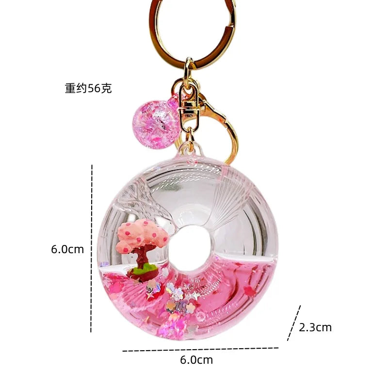 Llavero de purpurina con árbol de flor de cerezo