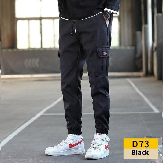 Pantalones cargo holgados para hombre, con múltiples bolsillos, resistentes al desgaste, de color liso y con banda en el tobillo