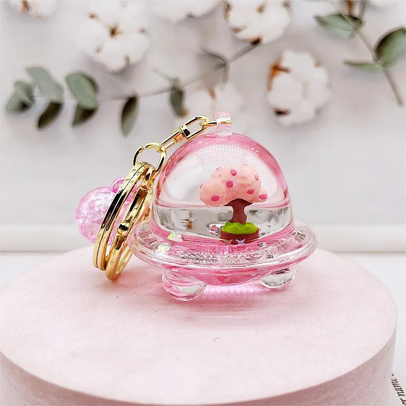 Llavero de purpurina con árbol de flor de cerezo