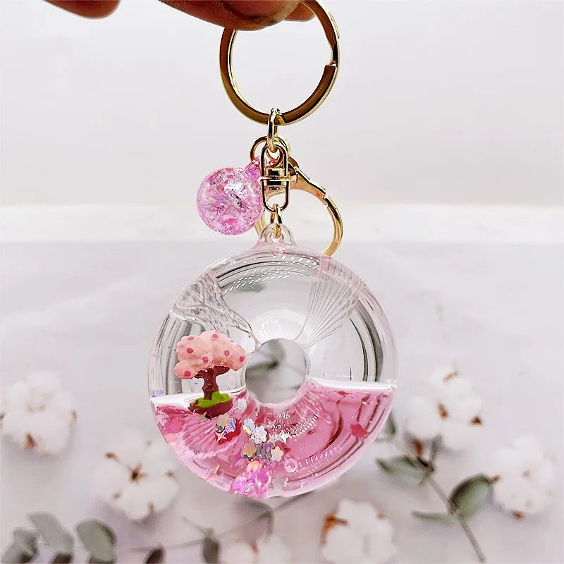 Llavero de purpurina con árbol de flor de cerezo