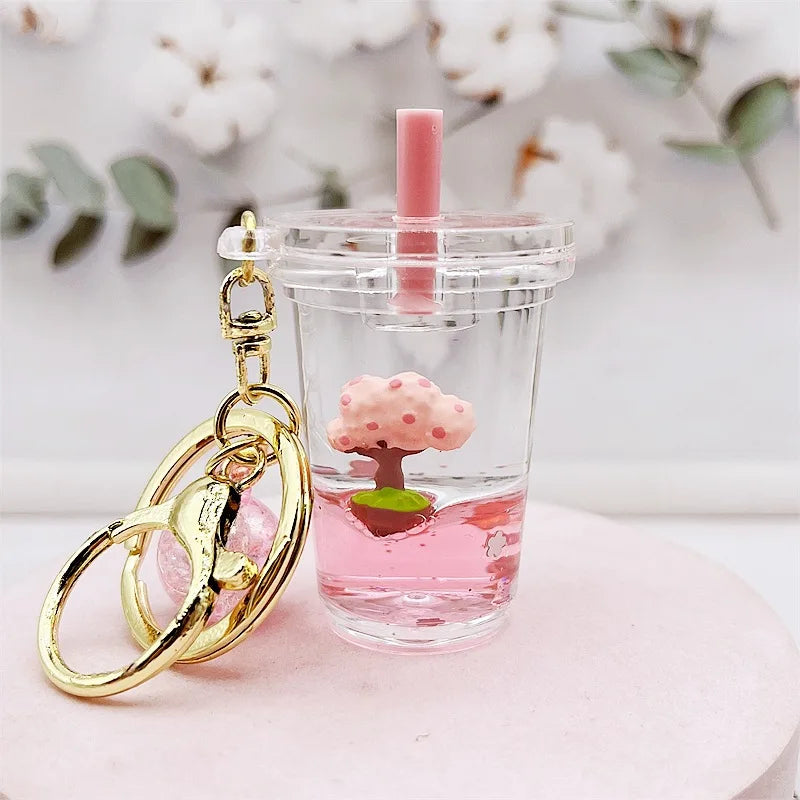 Llavero de purpurina con árbol de flor de cerezo