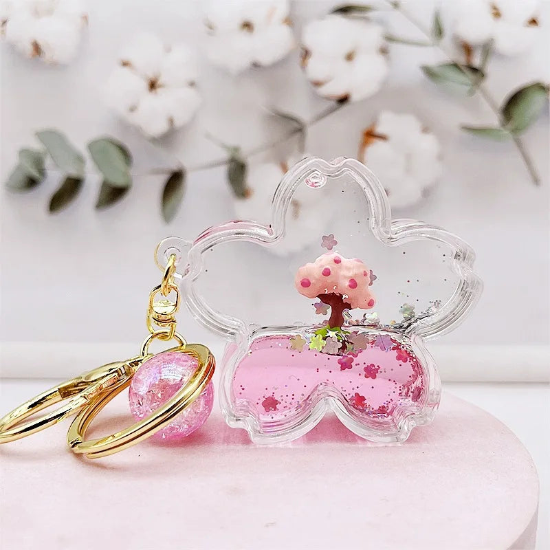 Llavero de purpurina con árbol de flor de cerezo