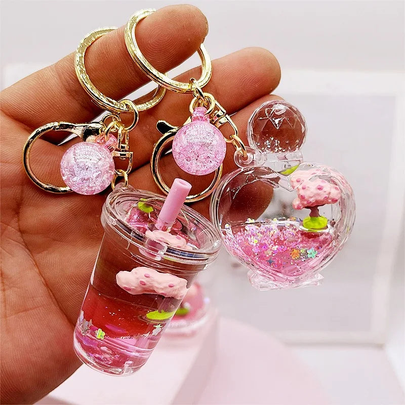 Llavero de purpurina con árbol de flor de cerezo