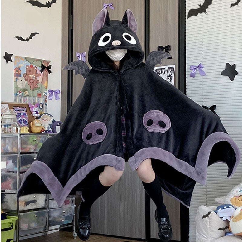 Capa de murciélago de peluche