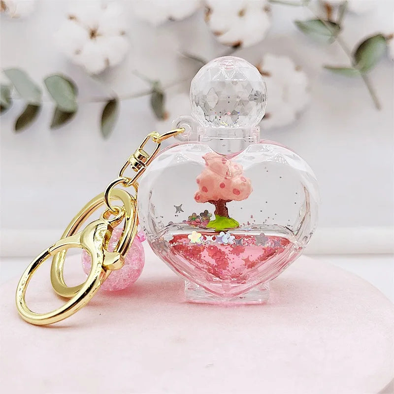 Llavero de purpurina con árbol de flor de cerezo