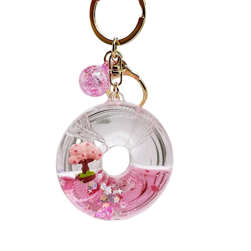 Llavero de purpurina con árbol de flor de cerezo