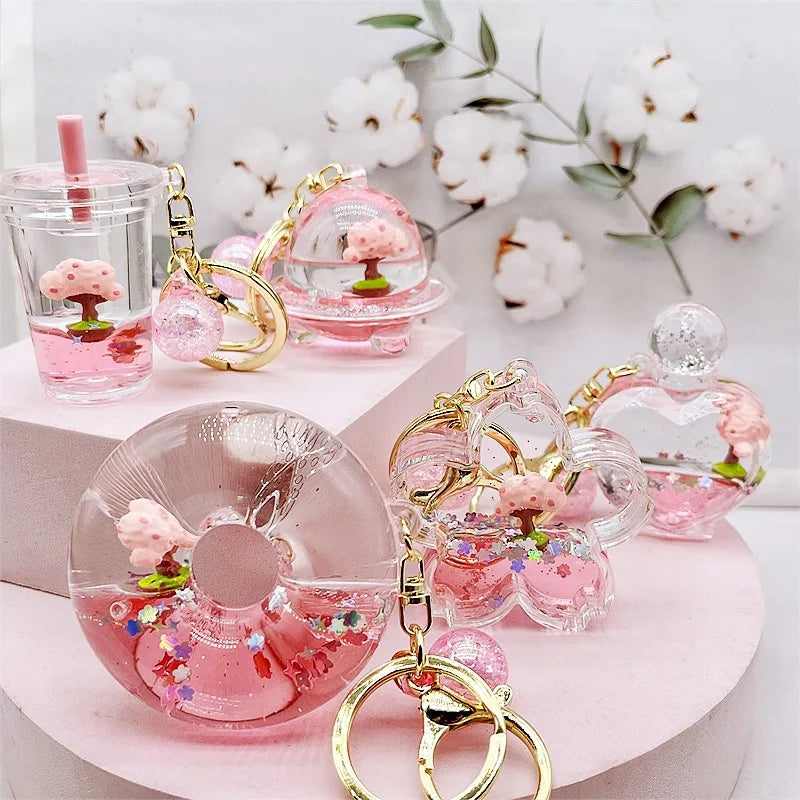 Llavero de purpurina con árbol de flor de cerezo